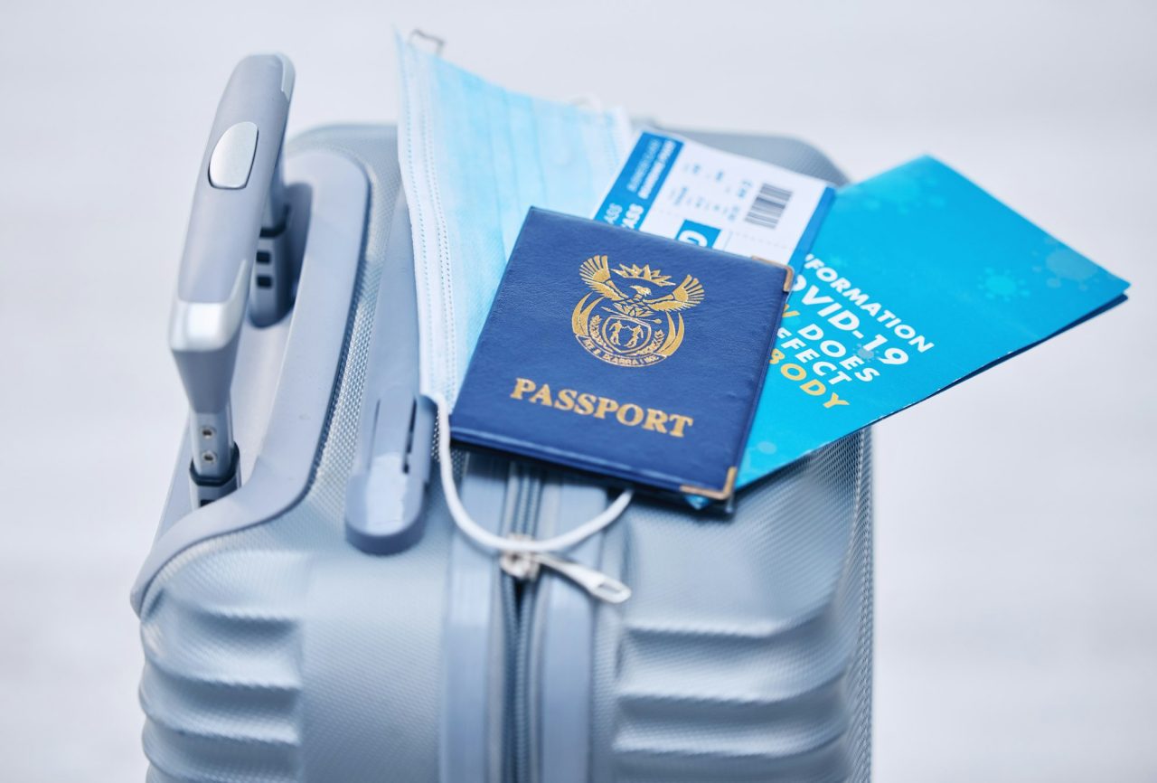 Passport and suitcase ready for a student visa application