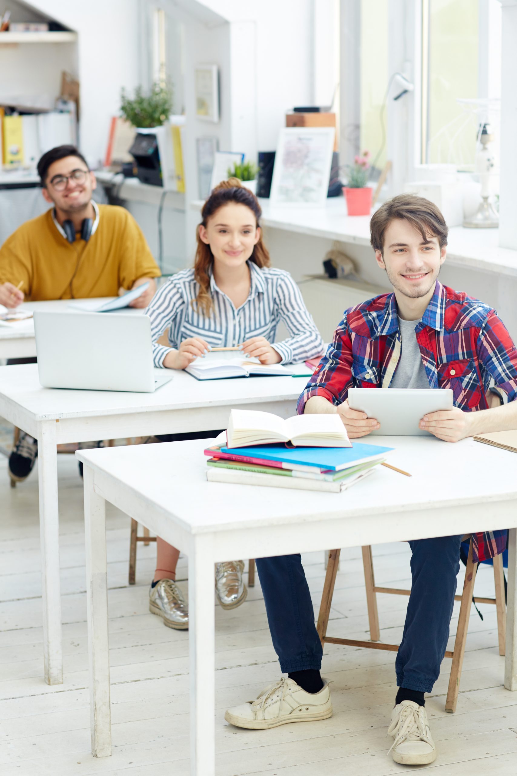 Students studying together in a classroom lesson